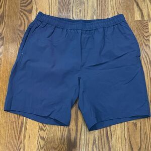 Myles Apparel 8” Elastic waist shorts with compression lining. Size Large.